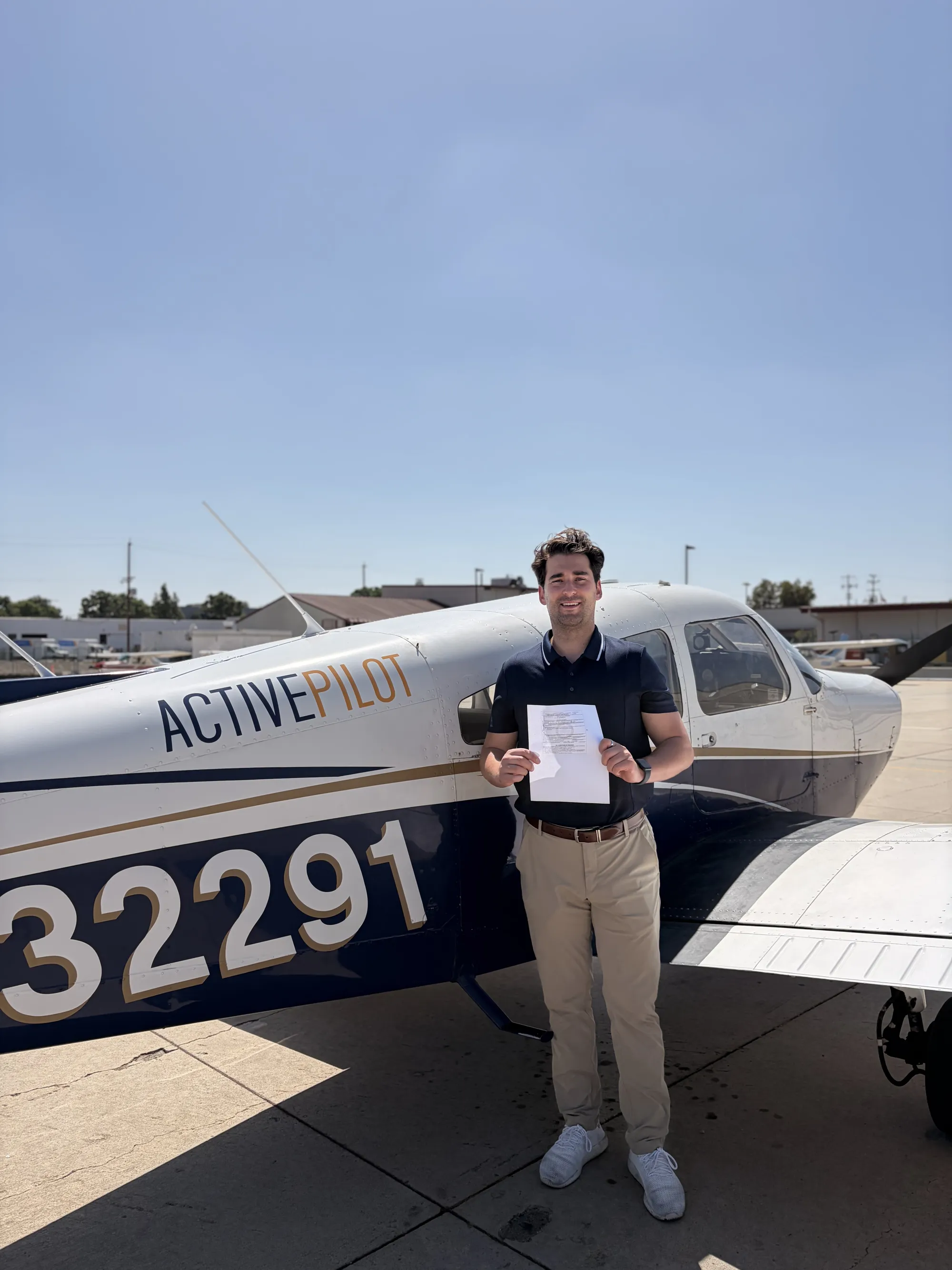 Jonathan Hernandez celebrating his private pilot checkride pass at ActivePILOT