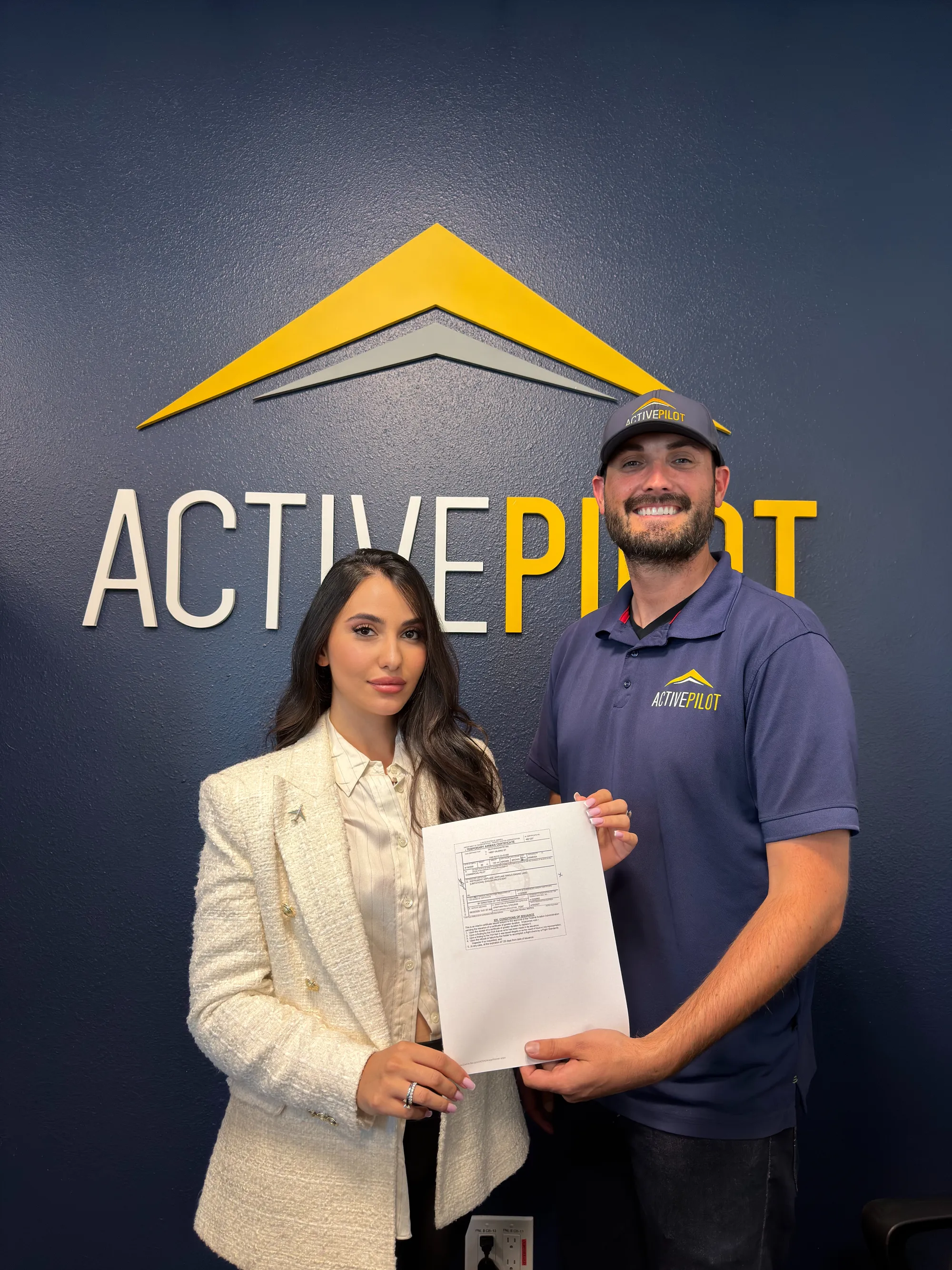 Silvi Khachatryan celebrating her commercial pilot checkride pass at ActivePILOT