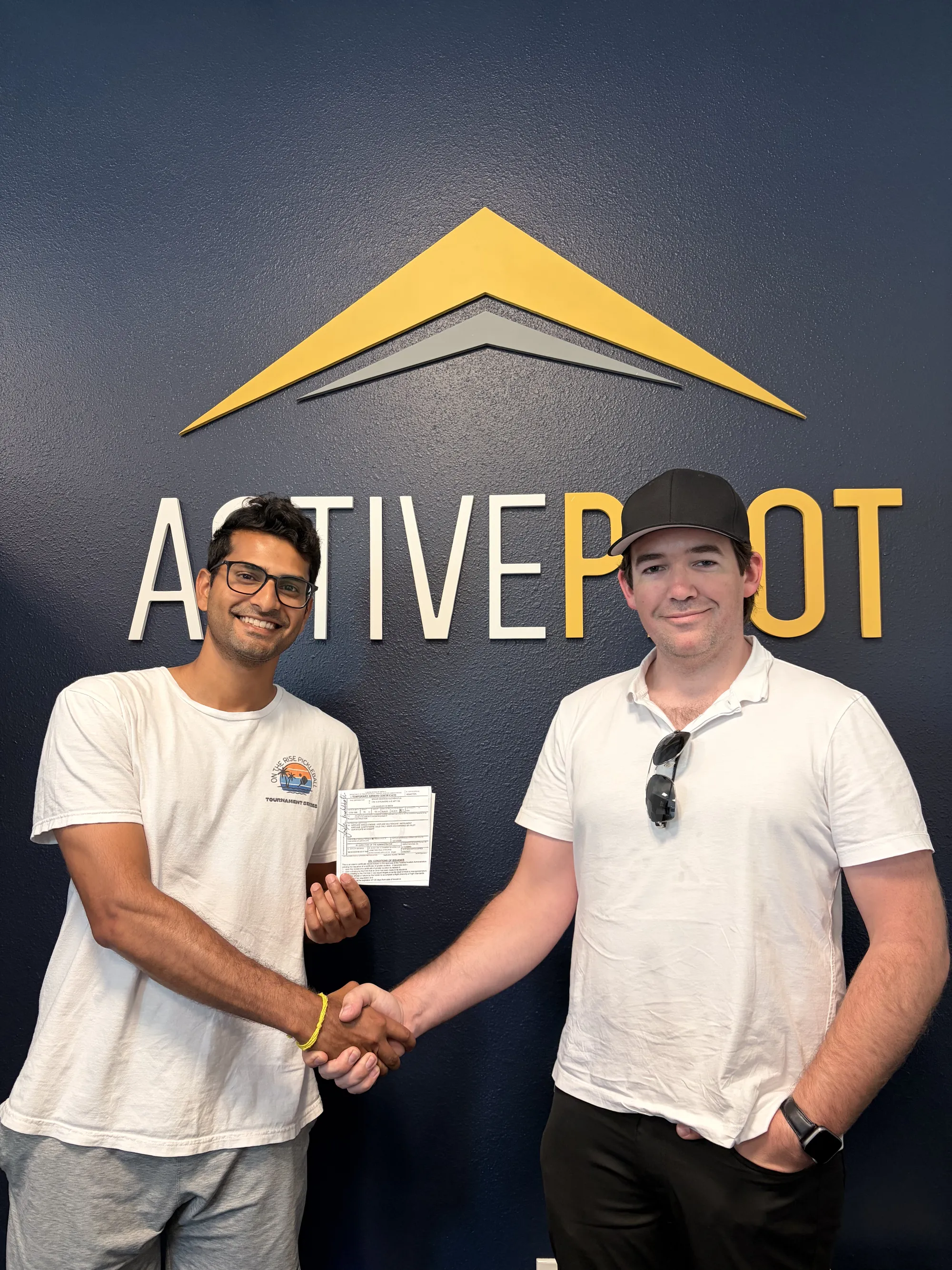 Srikar Kuchibhotla celebrating his multi-engine instructor checkride pass at ActivePILOT