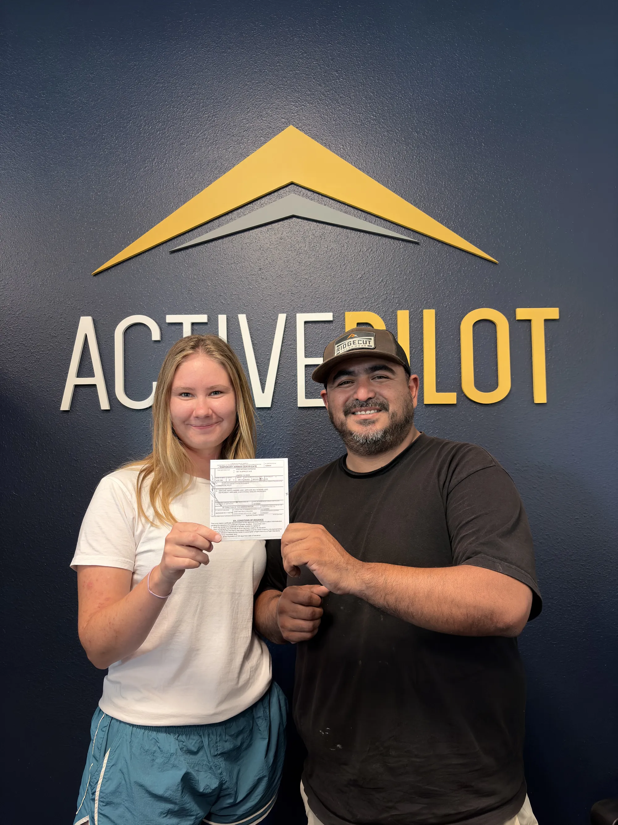 Tony Espinosa celebrating his commercial multi-engine add-on checkride pass at ActivePILOT