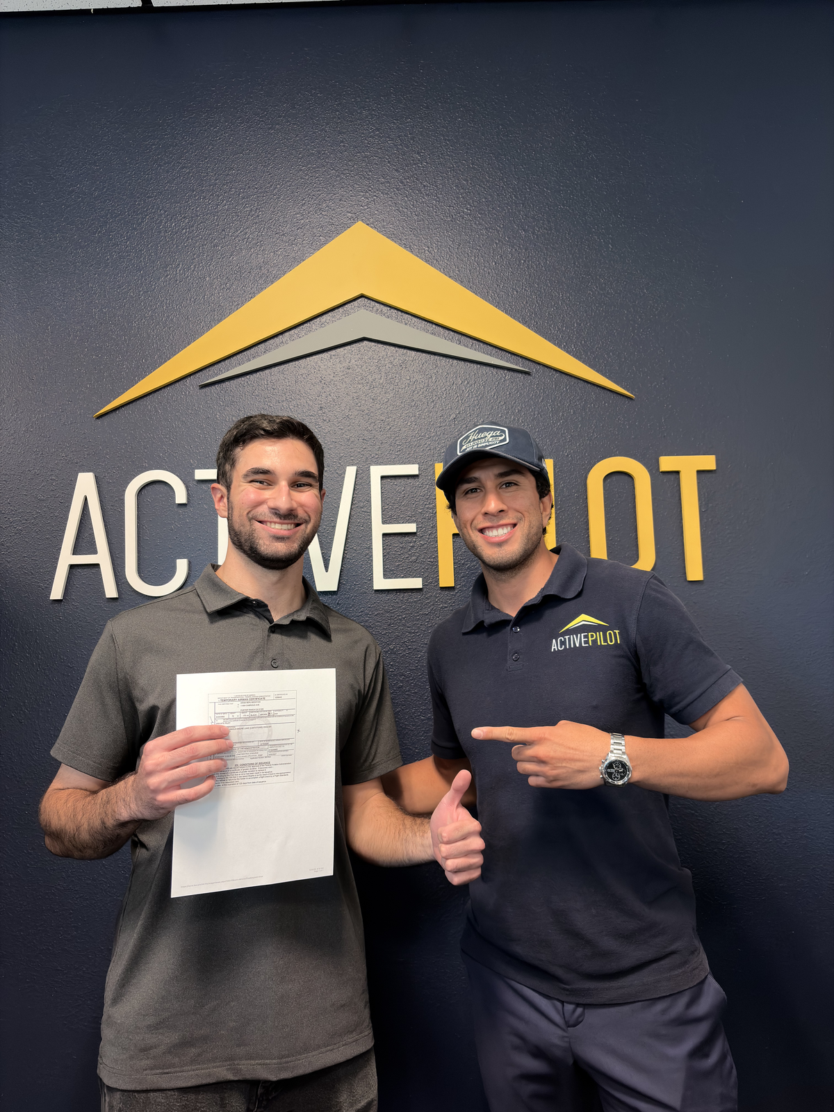 Aram Bedoyan celebrating his private pilot checkride pass at ActivePILOT