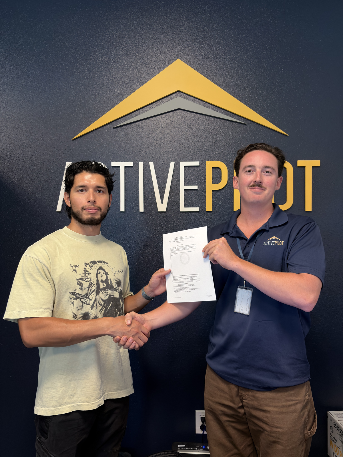 Ismael Deras celebrating his commercial multi-engine add-on checkride pass at ActivePILOT