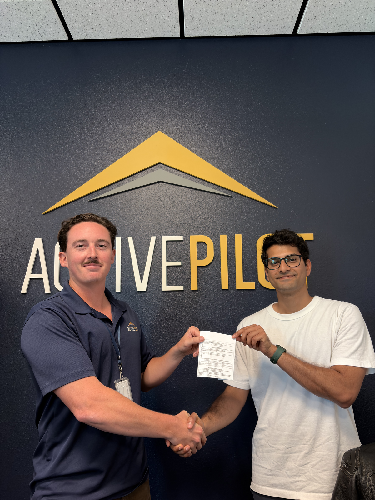Srikar Kuchibhotla celebrating his commercial multi-engine add-on checkride pass at ActivePILOT