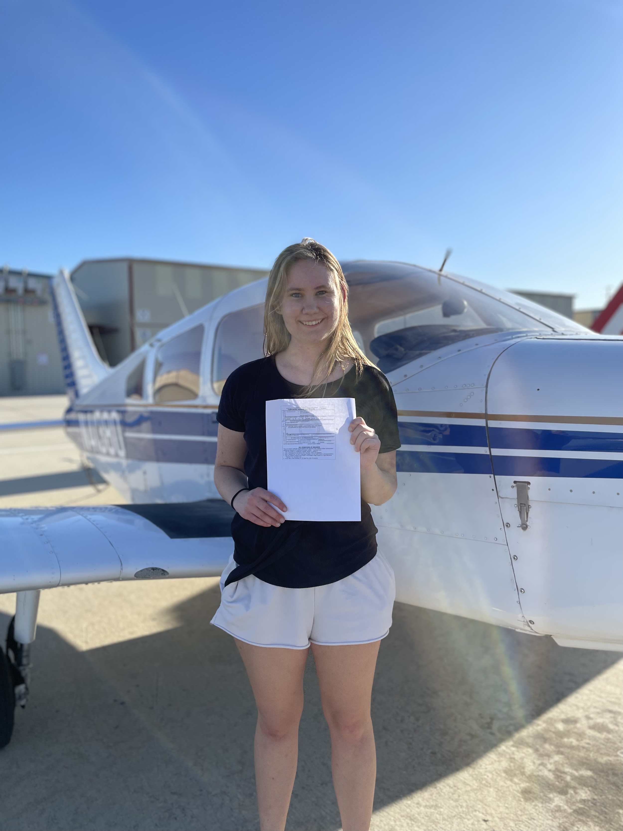 ActivePILOT student with certificate after passing CFI checkride at Van Nuys Airport