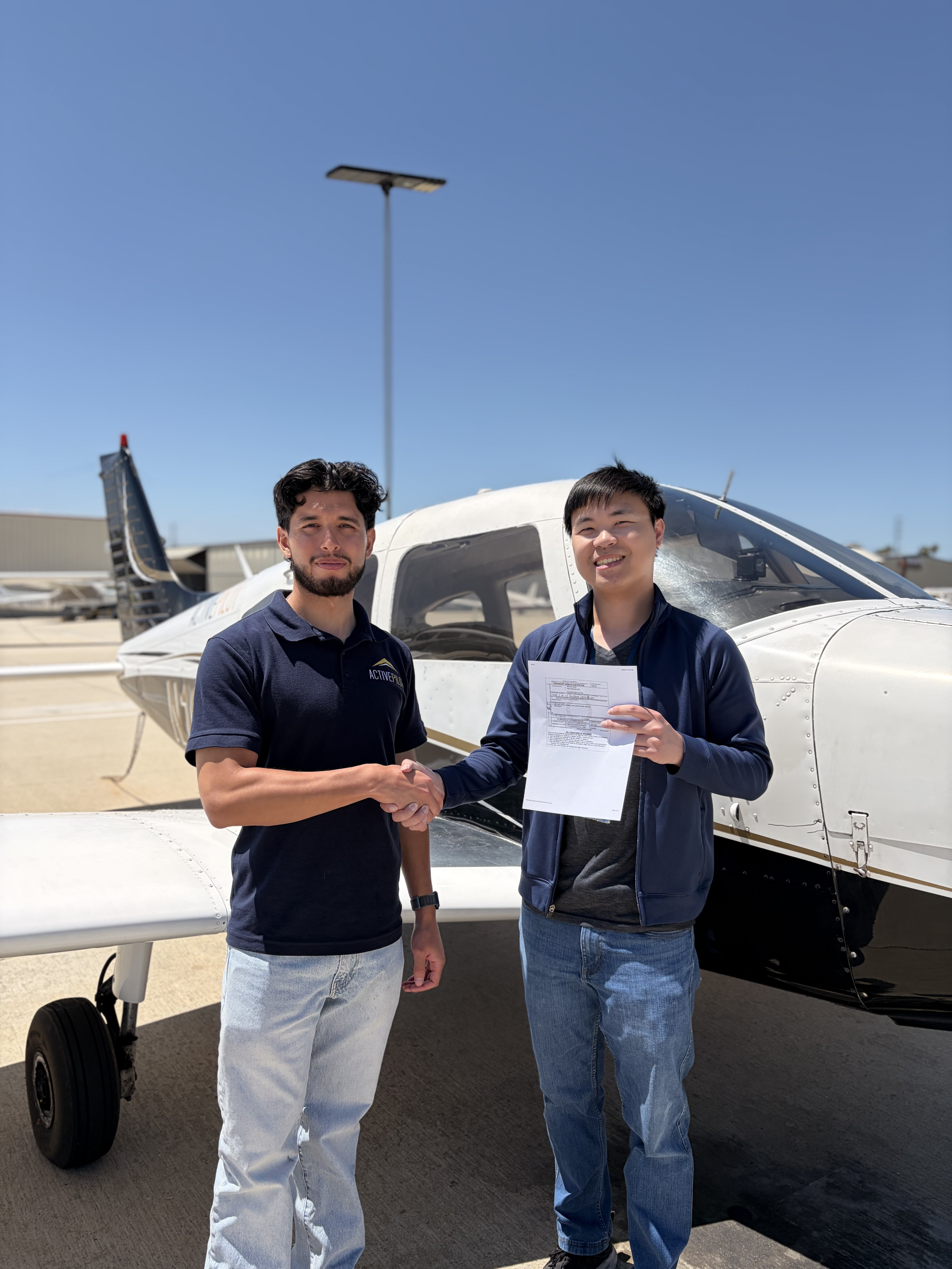 Benton Dang celebrating his private pilot checkride pass at ActivePILOT