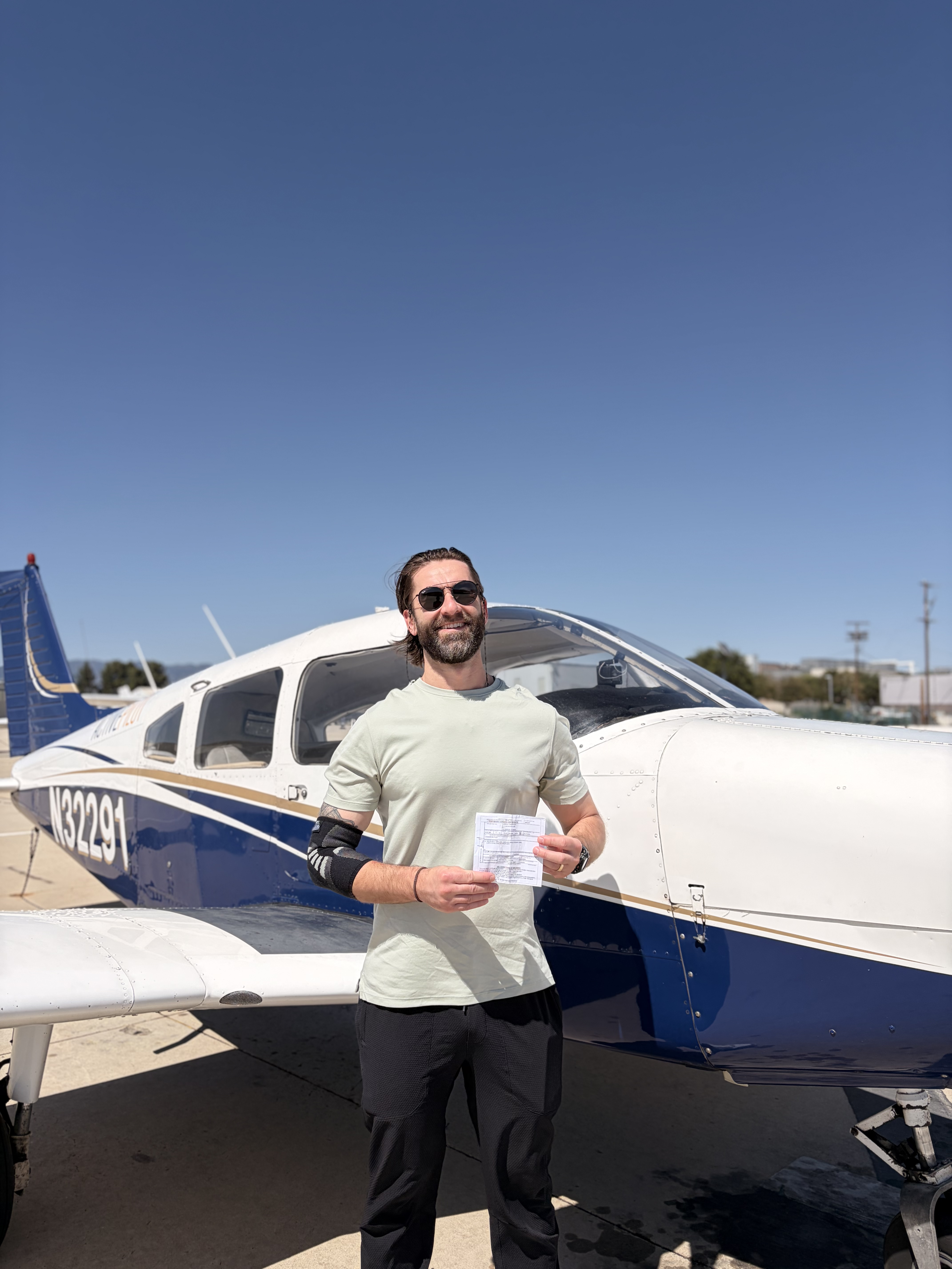Vlad Zapotocky celebrating his commercial pilot checkride pass at ActivePILOT