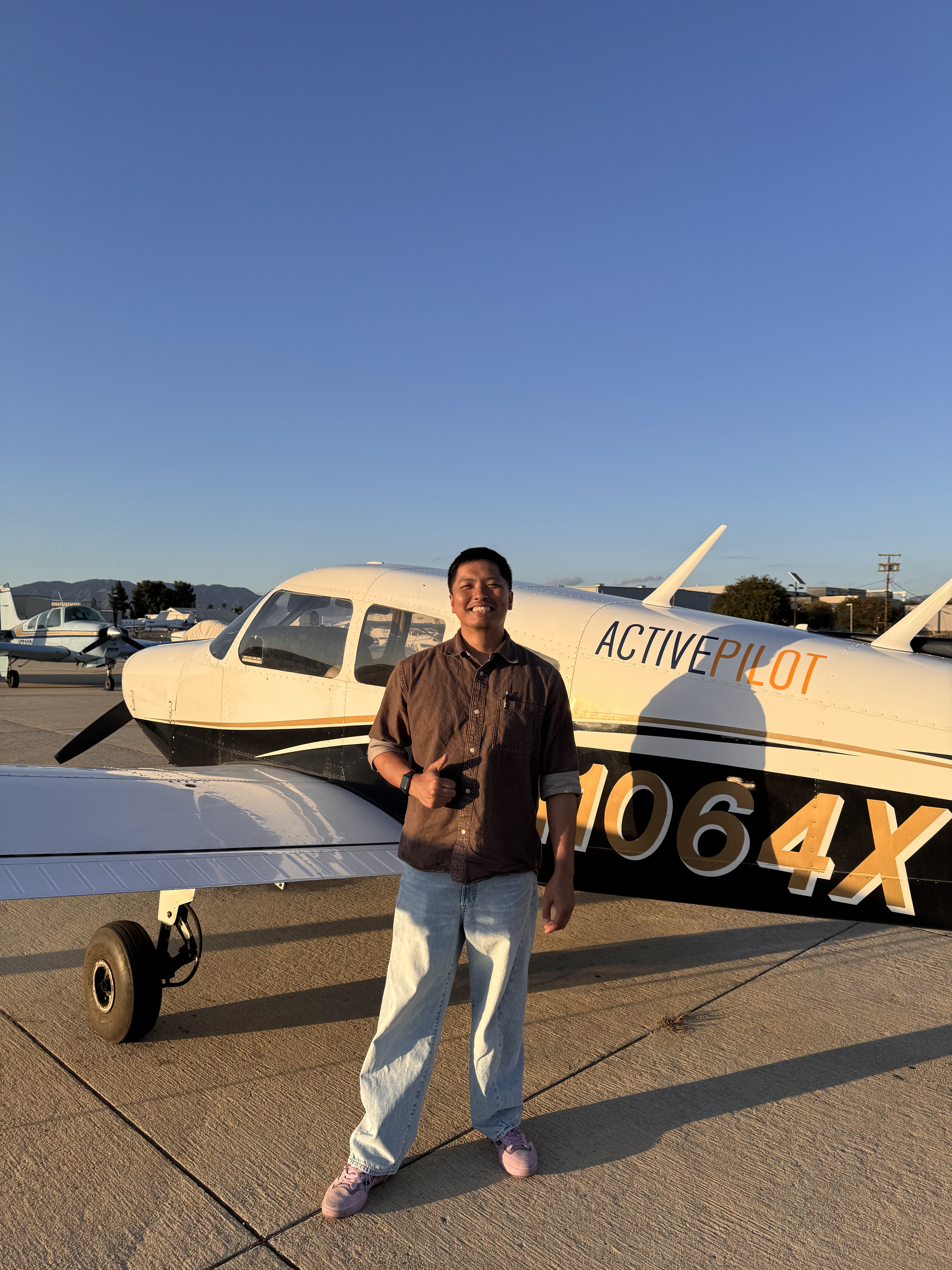William Chua celebrating his first solo flight at ActivePILOT