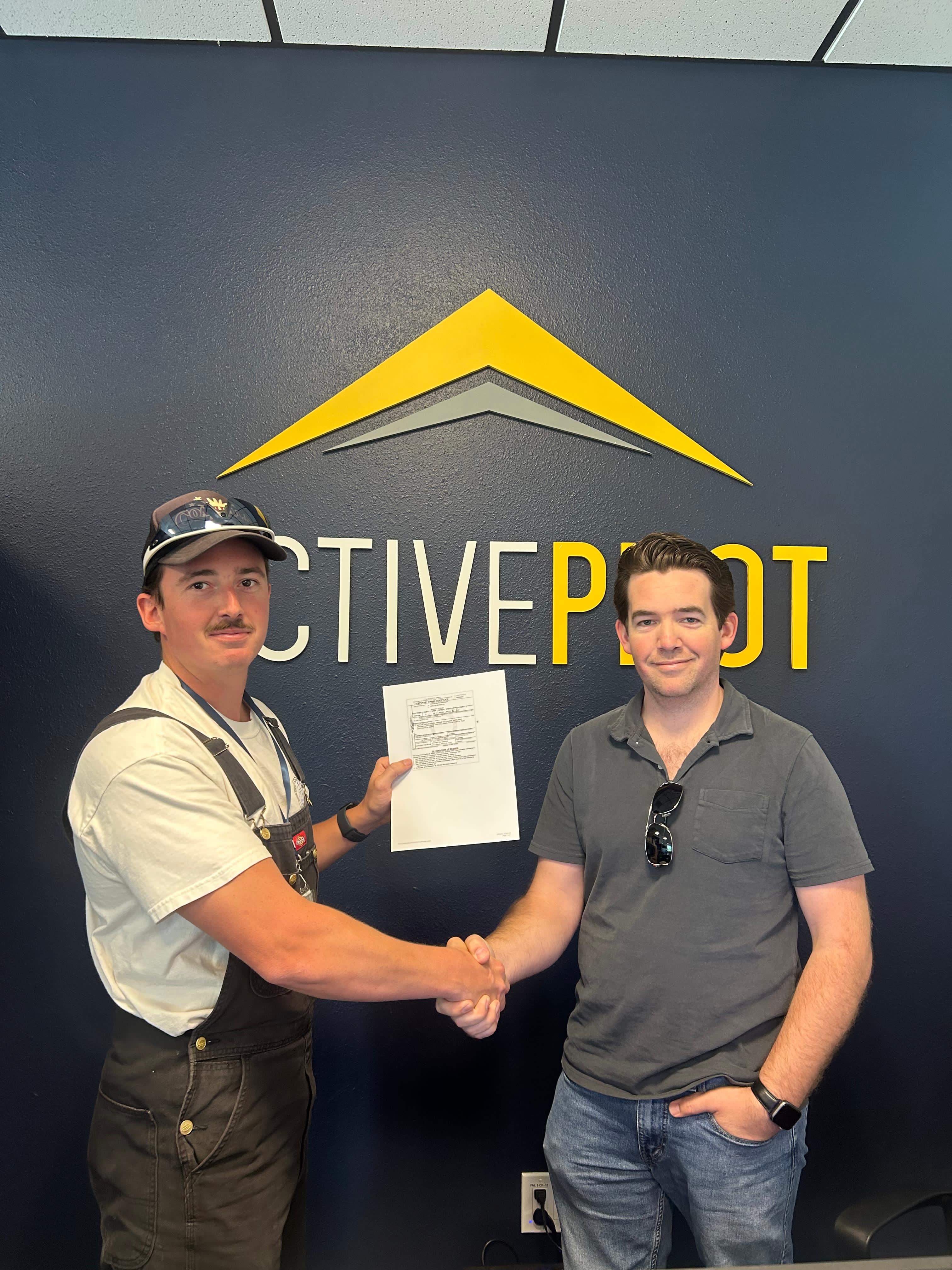 Carter Randolph celebrating a multi-engine instructor pass at ActivePILOT
