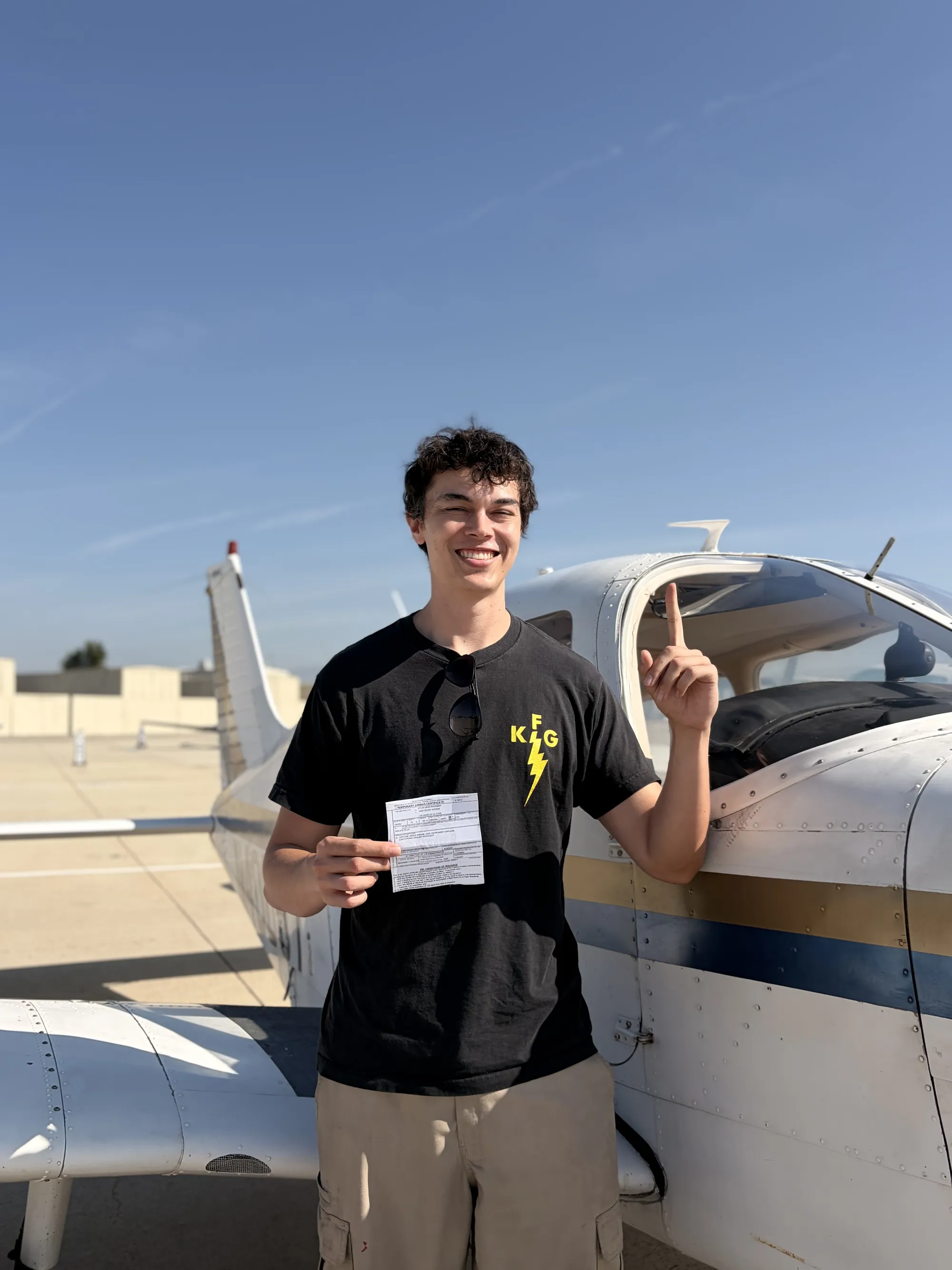 Dylan Roodman celebrating his instrument rating checkride pass at ActivePILOT