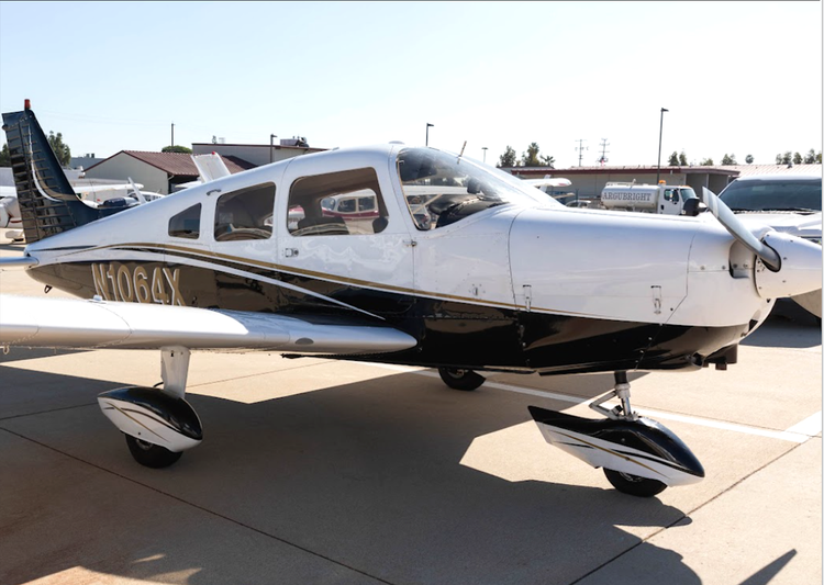 Front exterior view of Piper Warrior N1064X