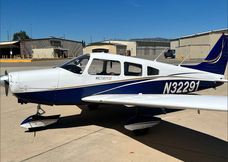 Piper Warrior N32291 on the ramp at Van Nuys Airport, available for block time aircraft rental